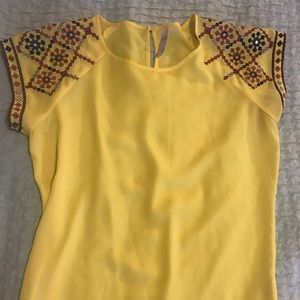 Francesca's yellow silk top